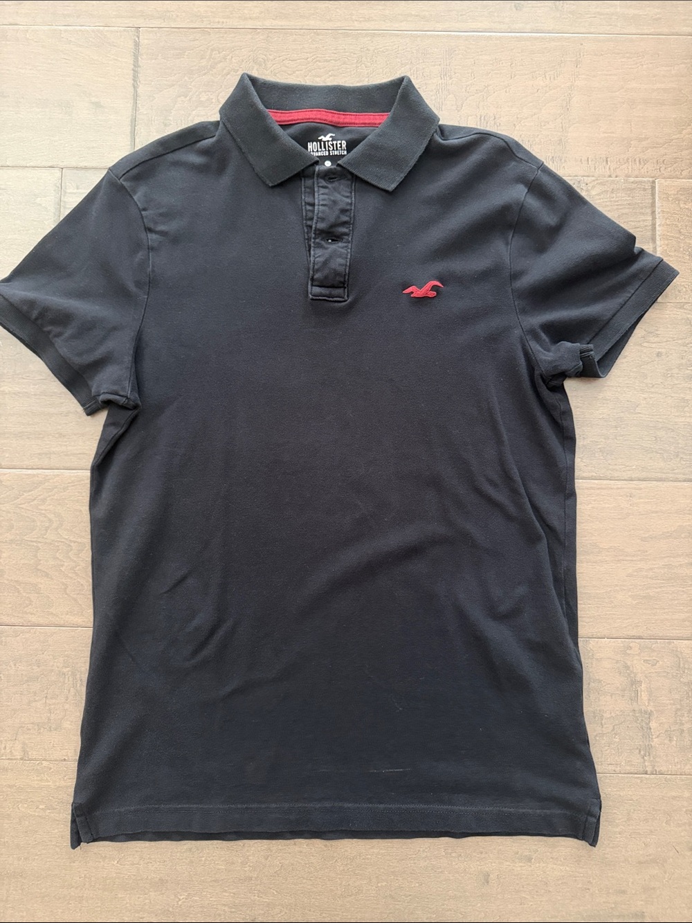 Hollister Men’s Black Polo with Red Logo Accent